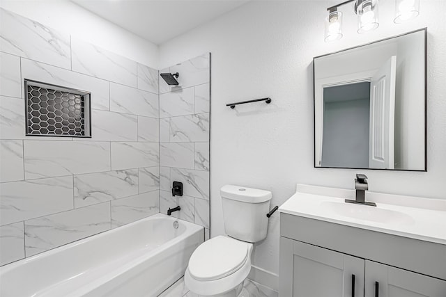 full bathroom featuring toilet, tiled shower / bath combo, and vanity