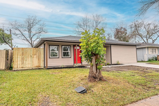 ranch-style home with a front yard