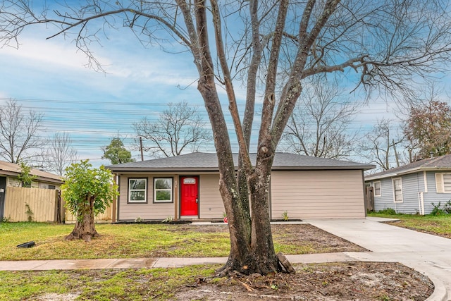 ranch-style home with a front yard