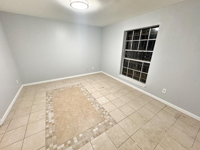 view of tiled spare room