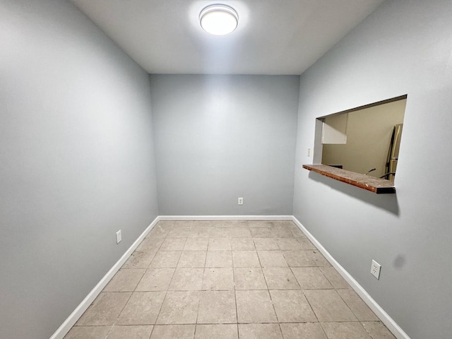 view of tiled spare room