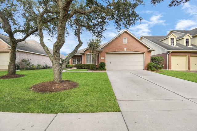 view of front facade with a front lawn and a garage