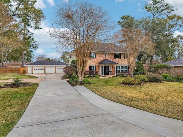 view of front facade with a garage and a front yard