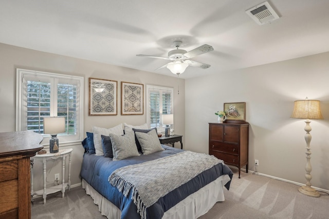 bedroom with ceiling fan and carpet flooring