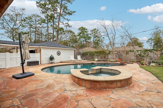 view of swimming pool featuring an in ground hot tub and a patio