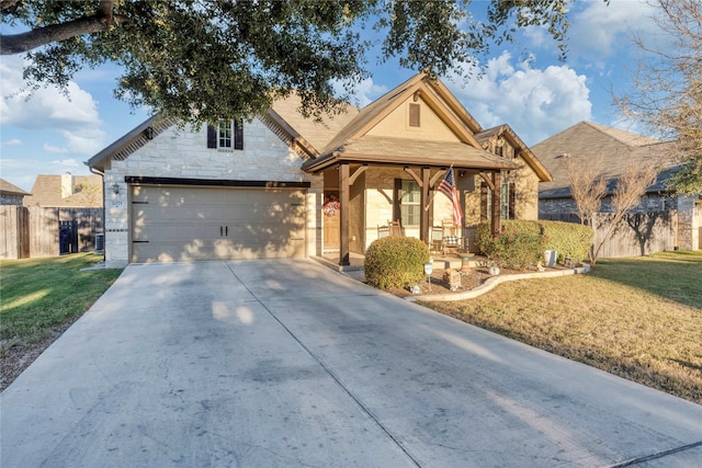 view of front facade featuring covered porch, a garage, and a front lawn