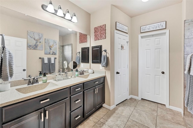 bathroom with vanity, tile patterned floors, and walk in shower