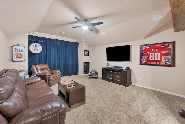 living room featuring ceiling fan, lofted ceiling, and carpet floors