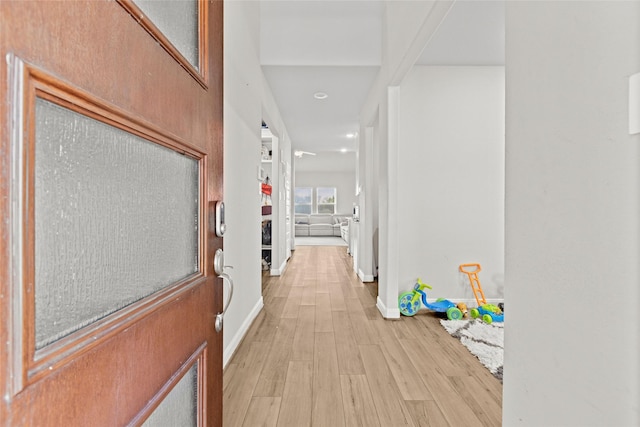 hall featuring light hardwood / wood-style flooring