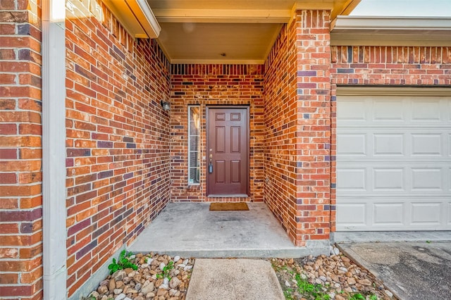 entrance to property with a garage