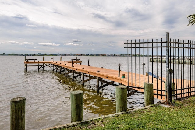 view of dock with a water view