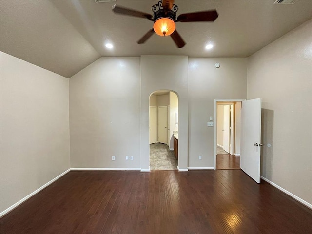 interior space featuring ceiling fan, dark hardwood / wood-style floors, and high vaulted ceiling