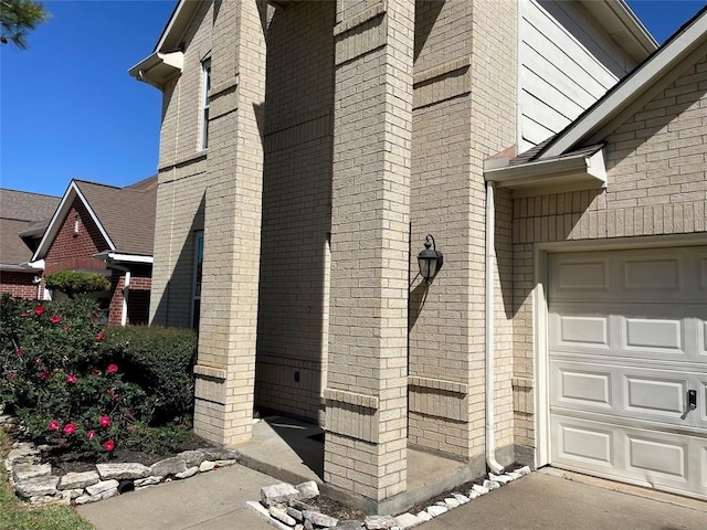 view of side of property featuring a garage