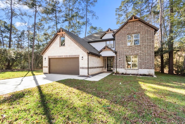 view of front of house with a garage and a front lawn