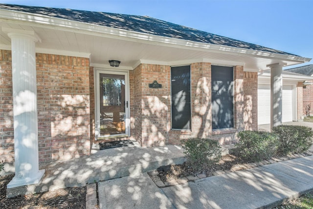 property entrance featuring a garage