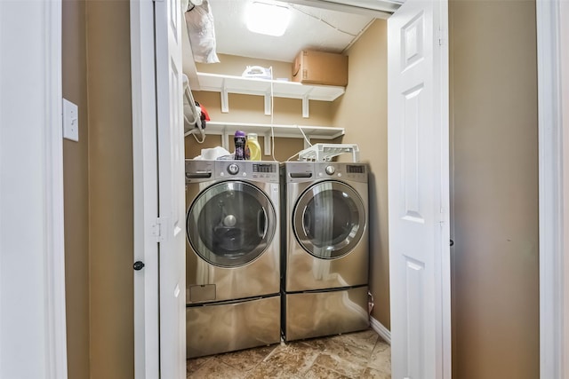 laundry area with washer and clothes dryer