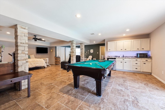 game room with sink, pool table, ceiling fan, and ornate columns