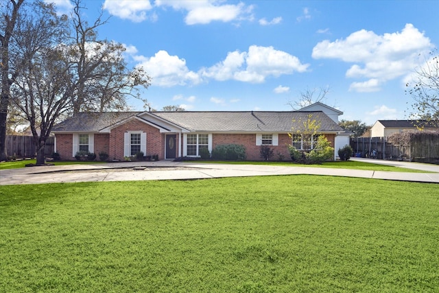 ranch-style house with a front yard