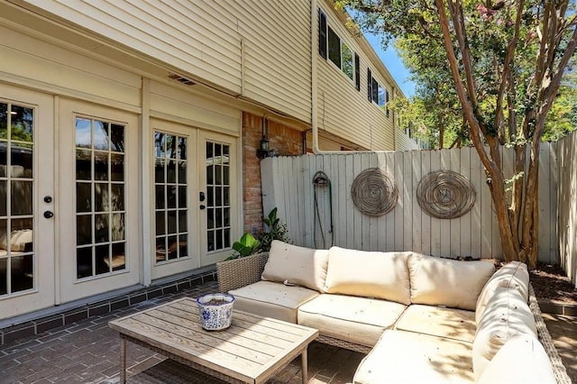 view of patio featuring french doors and an outdoor hangout area