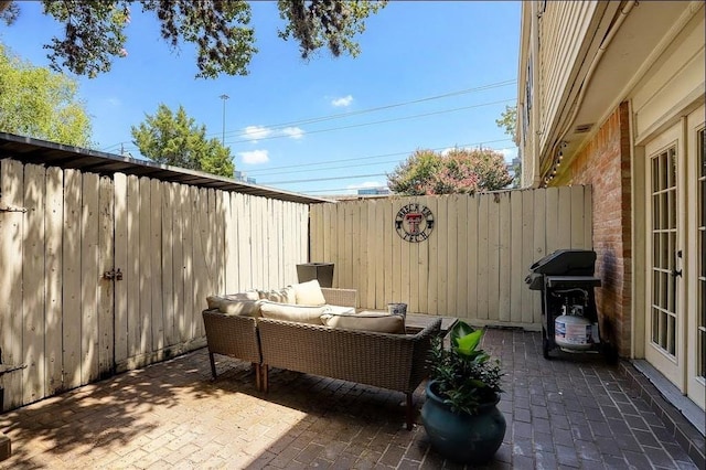 view of patio / terrace with a grill and an outdoor hangout area