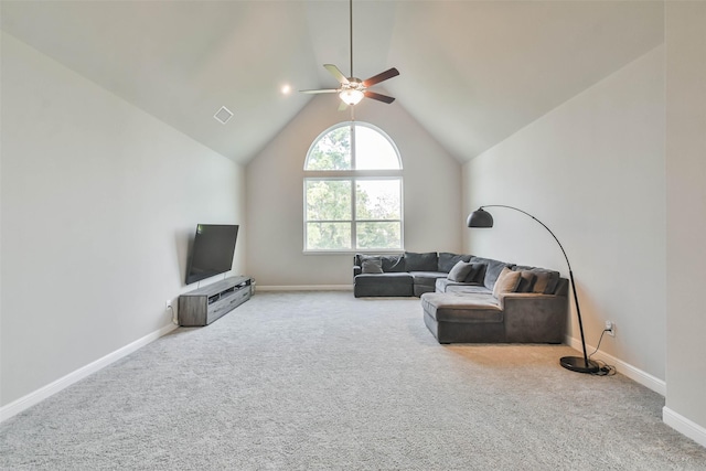 living room with carpet, ceiling fan, and lofted ceiling