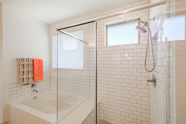 bathroom with independent shower and bath