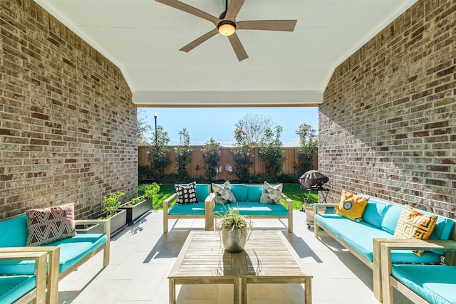 view of patio featuring an outdoor hangout area and ceiling fan