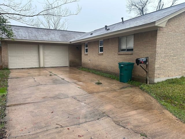 view of home's exterior with a garage