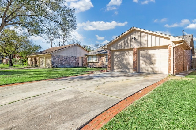 single story home featuring a front yard and a garage