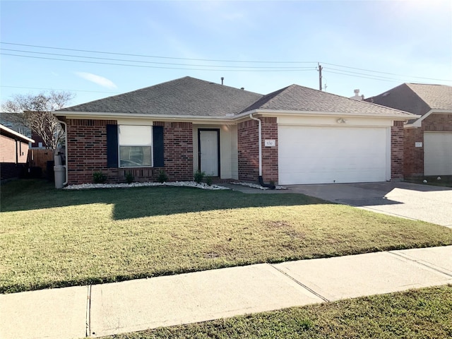 single story home featuring a garage and a front lawn