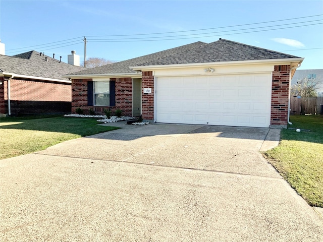 ranch-style home with a garage and a front lawn