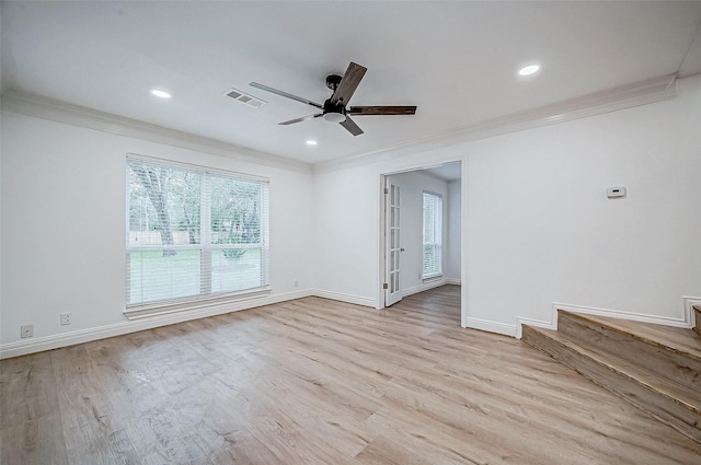 unfurnished room with crown molding, ceiling fan, and light wood-type flooring