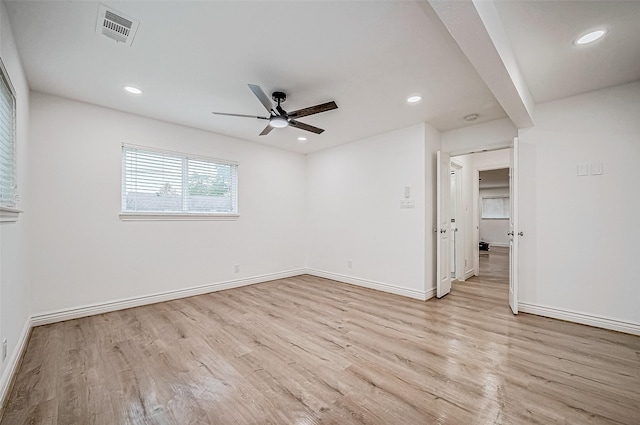 unfurnished room with light hardwood / wood-style floors and ceiling fan