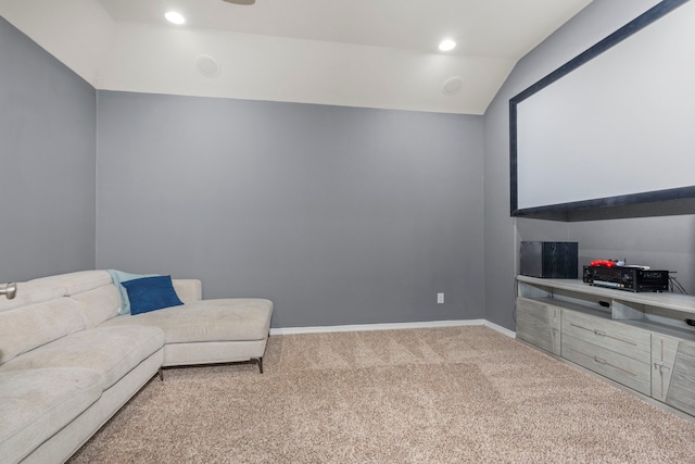 cinema room featuring lofted ceiling, light colored carpet, baseboards, and recessed lighting