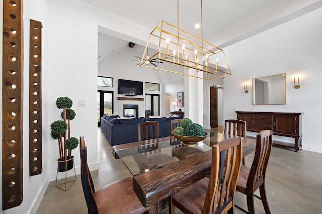 4103 Lea Ln, Fulshear, TX 77406 - dining room featuring concrete floors and high vaulted ceiling