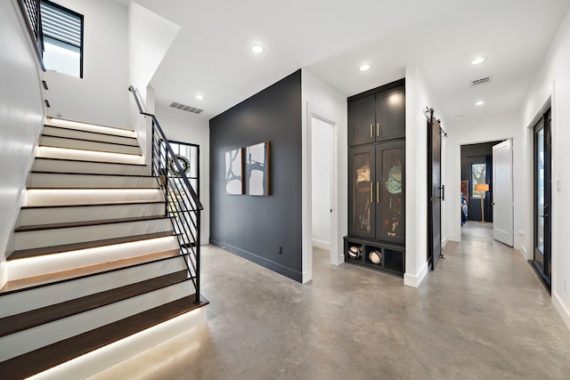 4103 Lea Ln, Fulshear, TX 77406 - entryway with finished concrete flooring, stairway, and recessed lighting