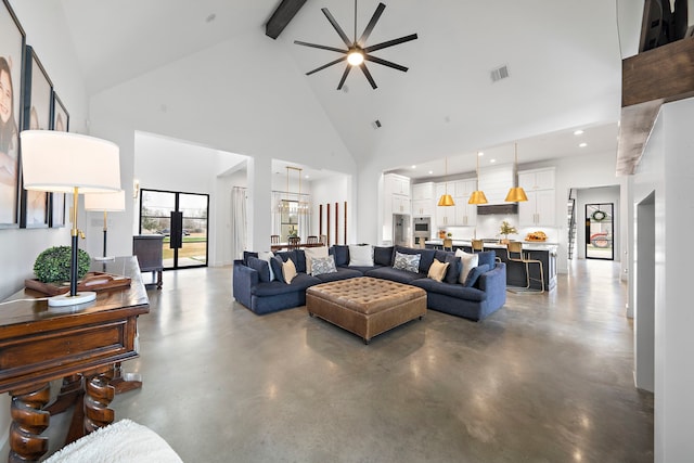 4103 Lea Ln, Fulshear, TX 77406 - living area with high vaulted ceiling, finished concrete floors, ceiling fan, beam ceiling, and recessed lighting