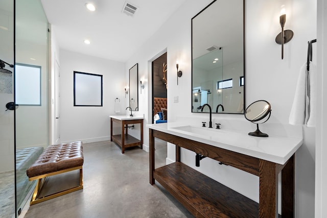 4103 Lea Ln, Fulshear, TX 77406 - ensuite bathroom with finished concrete flooring, walk in shower, vanity, and recessed lighting