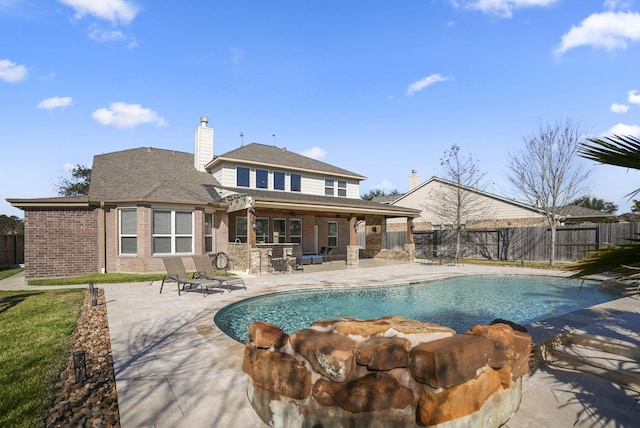 view of pool featuring a patio area