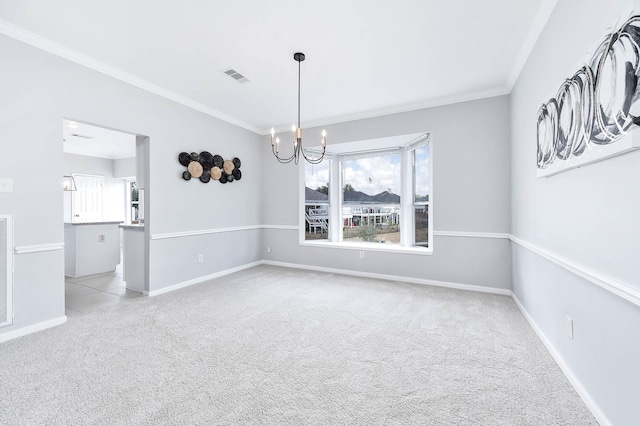 empty room with a notable chandelier, light colored carpet, and ornamental molding