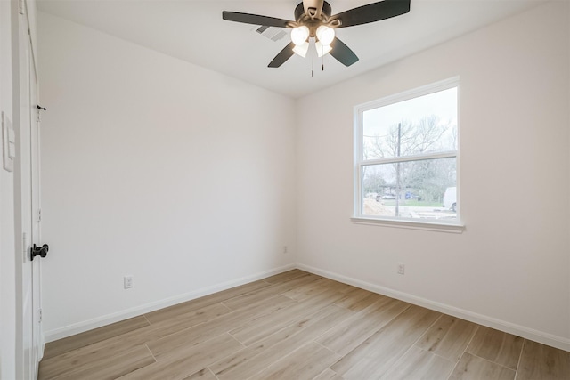 spare room featuring ceiling fan