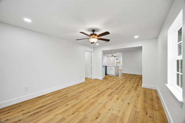 unfurnished living room featuring light hardwood / wood-style flooring