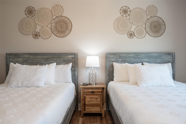 bedroom featuring dark hardwood / wood-style flooring