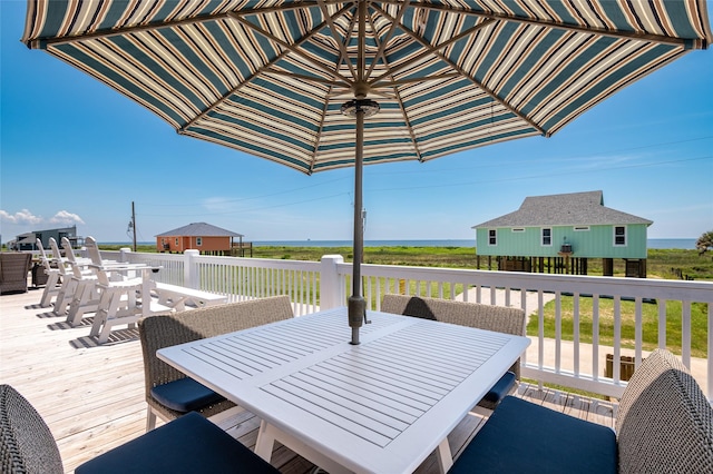 deck featuring a water view