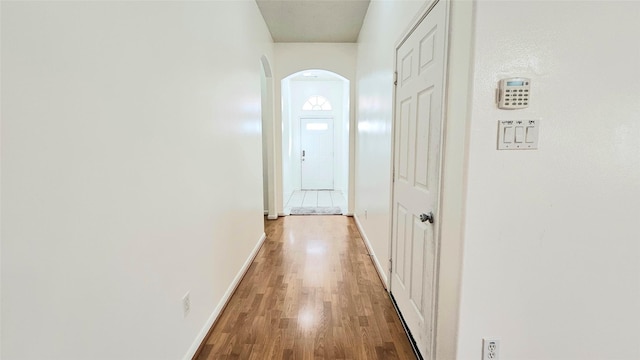 hallway featuring hardwood / wood-style floors