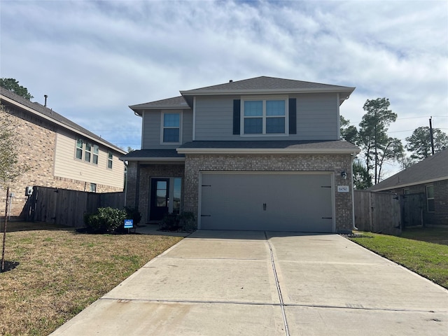 front facade with a front yard and a garage