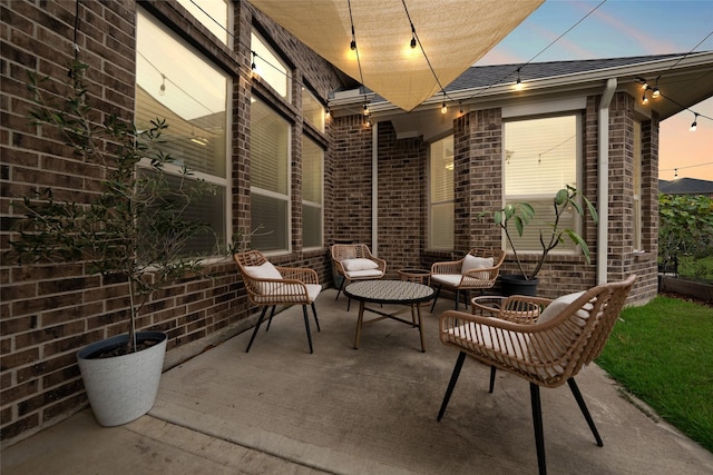 patio terrace at dusk with outdoor lounge area