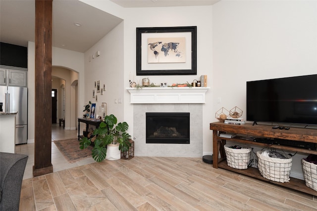 living room featuring a fireplace