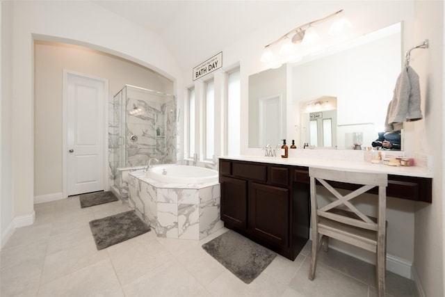 bathroom featuring separate shower and tub, tile patterned flooring, and vanity