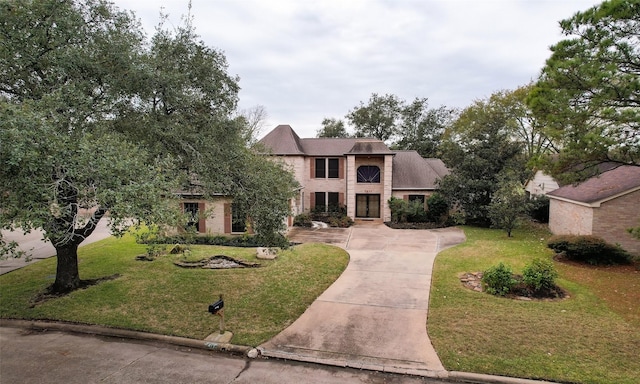 view of front of house with a front lawn